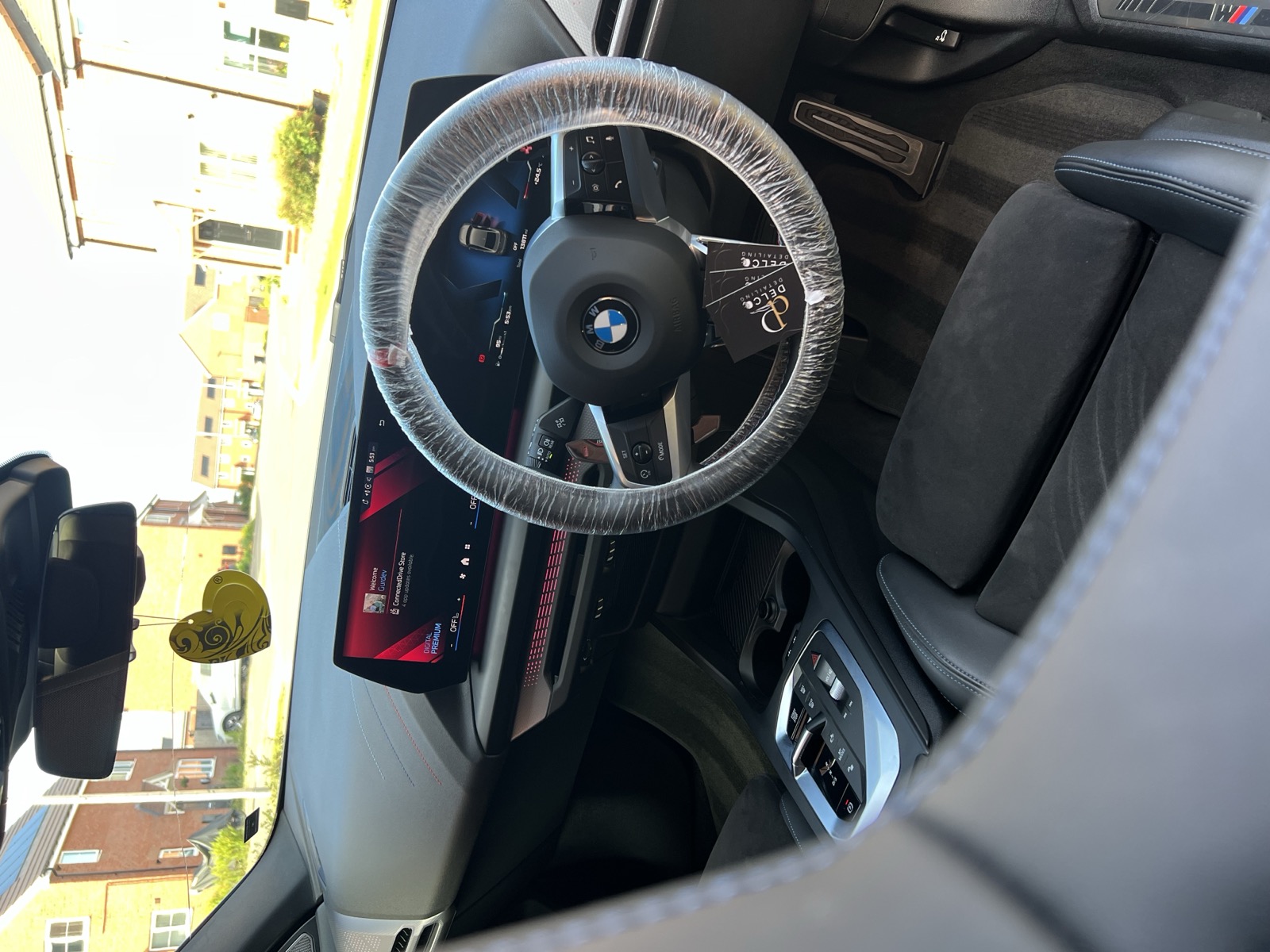 BMW interior detail, fresh steering wheel wrap