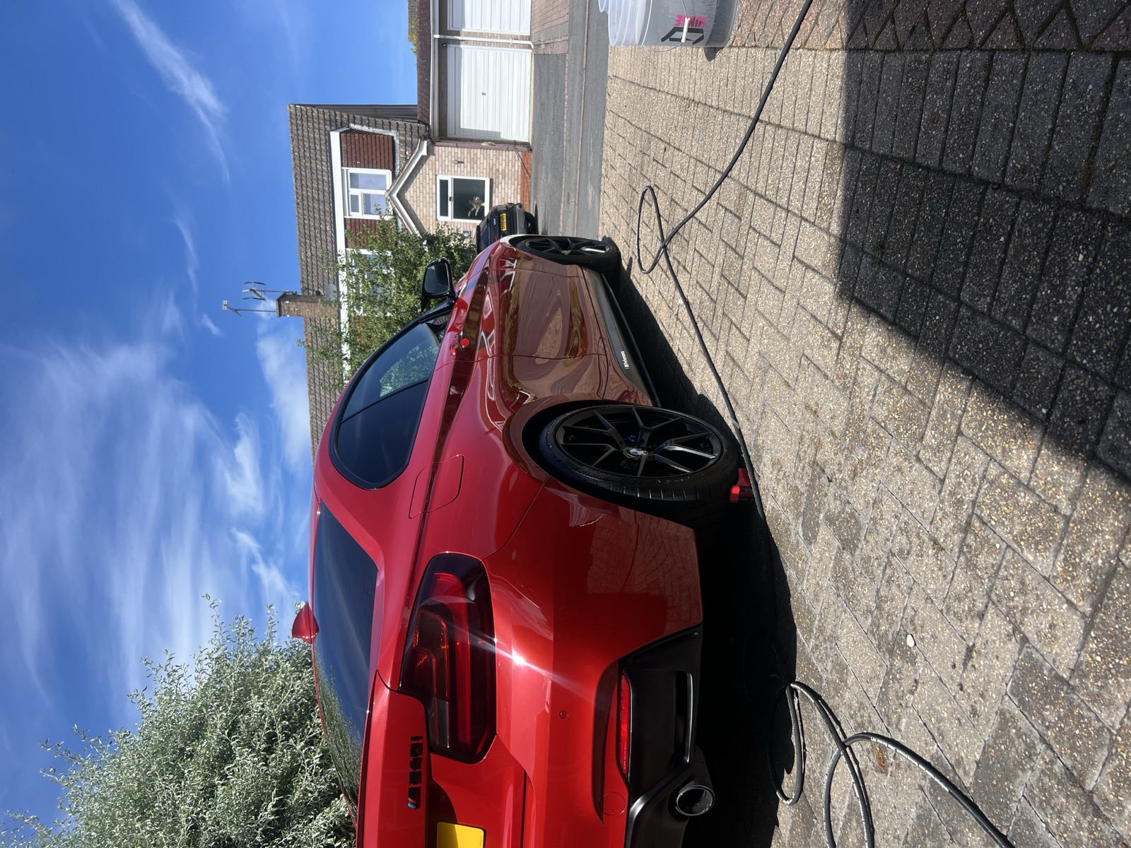BMW M235i exterior detail, red paintwork